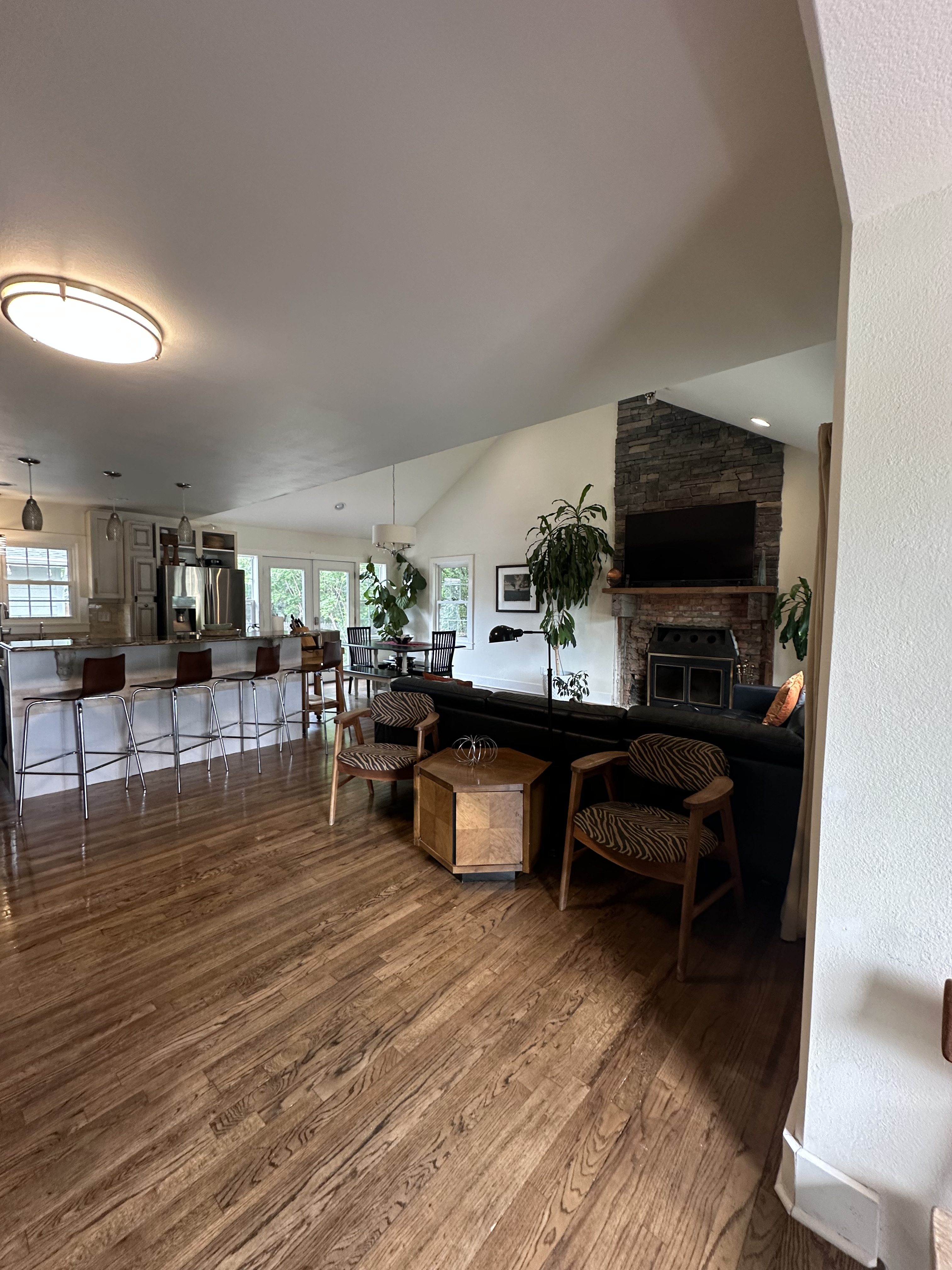 Open-concept home living room and kitchen after professional cleaning